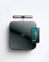 Smart weight scale with smartphone app on a white background